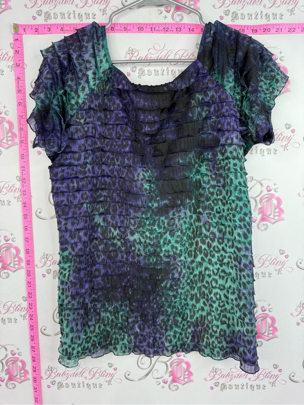 Bellissima Women’s Animal-Print Ruffled Short Sleeve Blouse in Teal & Purple